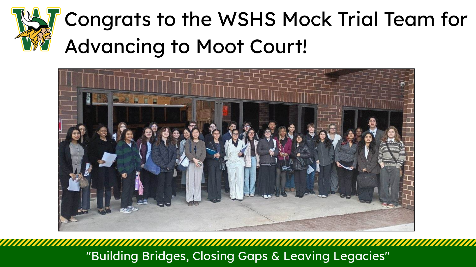 WSHS Mock Trial Team group photo outside a school building, celebrating advancement to Moot Court.