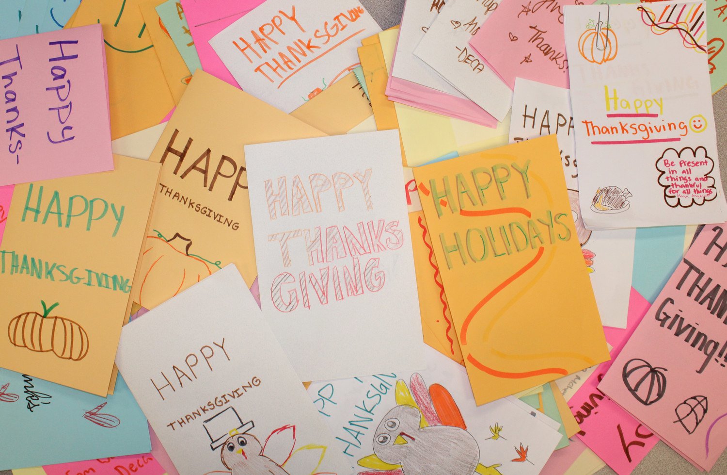 Cards made by DECA Students for assisted living facility sharing Thanksgiving greetings. 