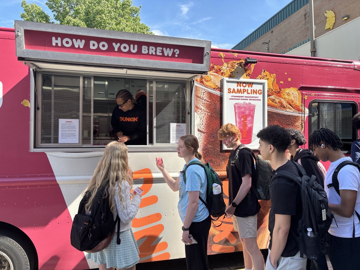 Dunkin' Donuts truck giving free drinks to students
