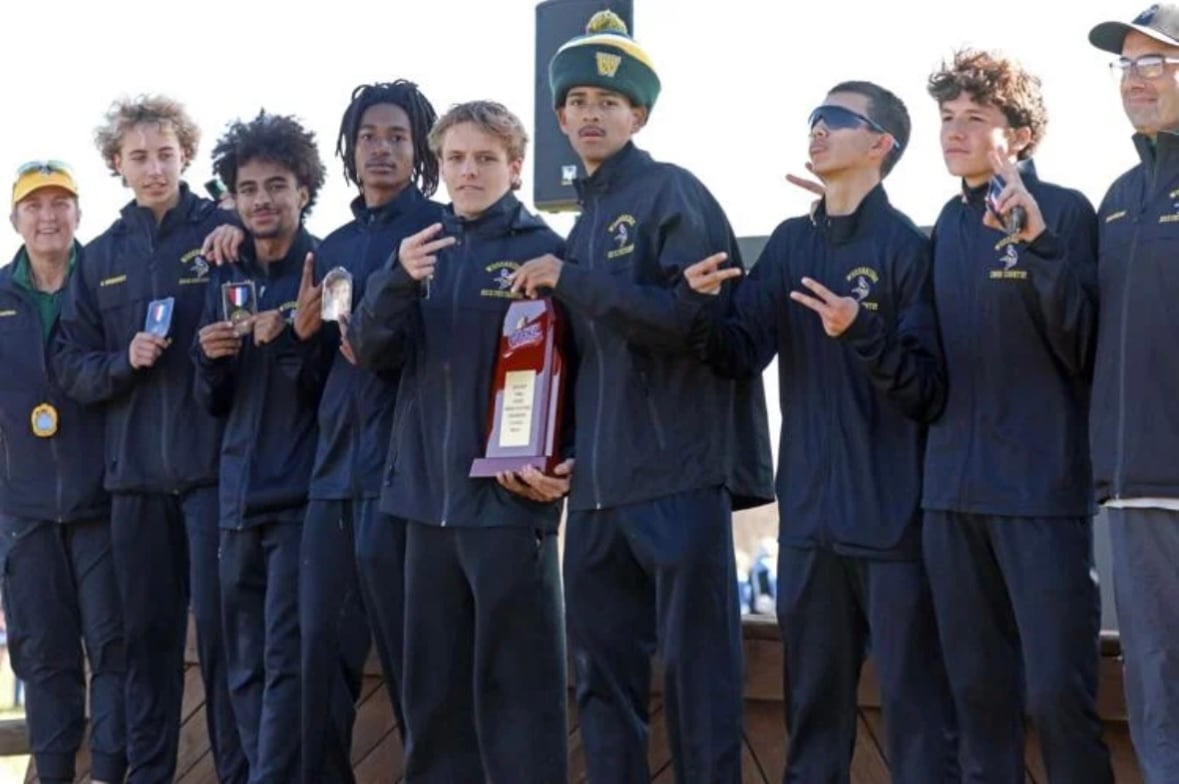 WSHS Cross country team on podium after their state win