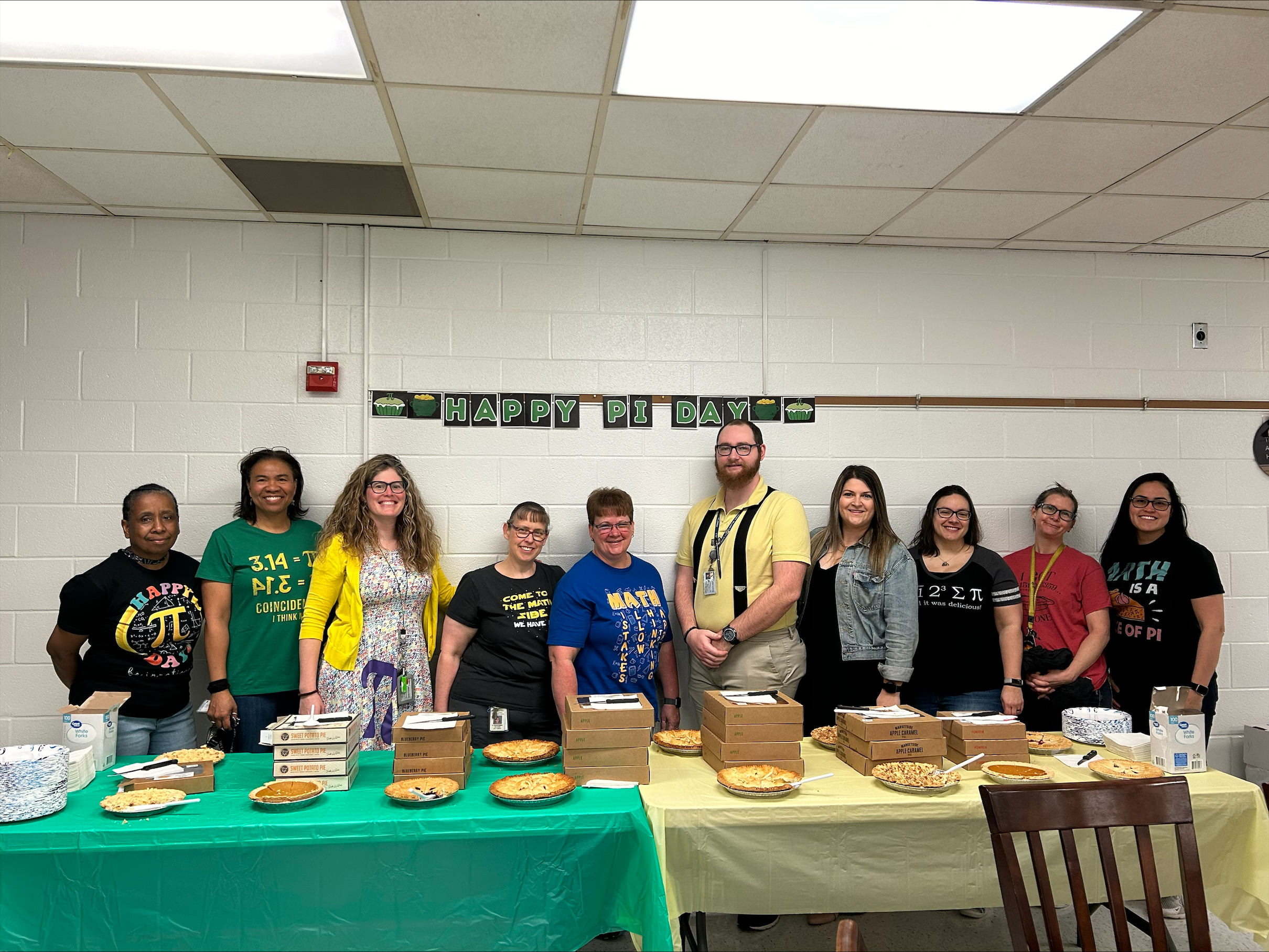wshs math department in front of pi day pies